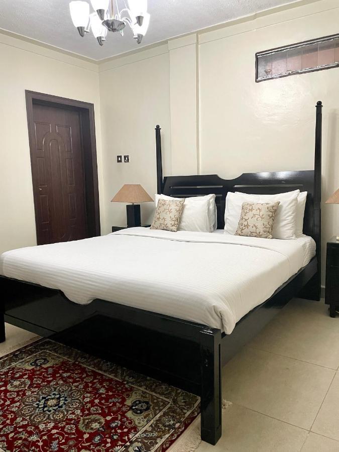 Mackinnon Suites Kampala Bagian luar foto